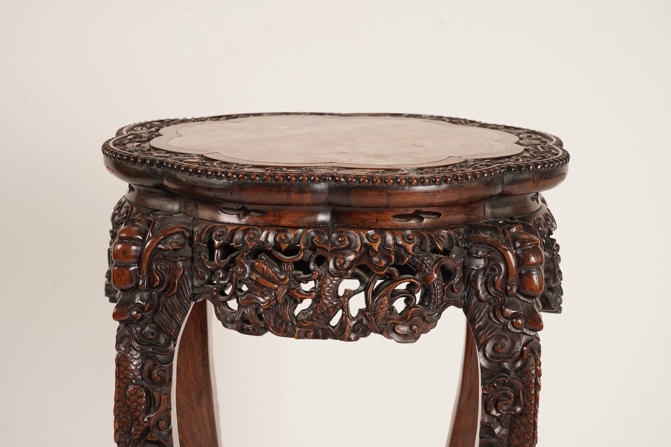 A Chinese hongmu and marble ‘dragon’ jardiniere stand, late 19th century